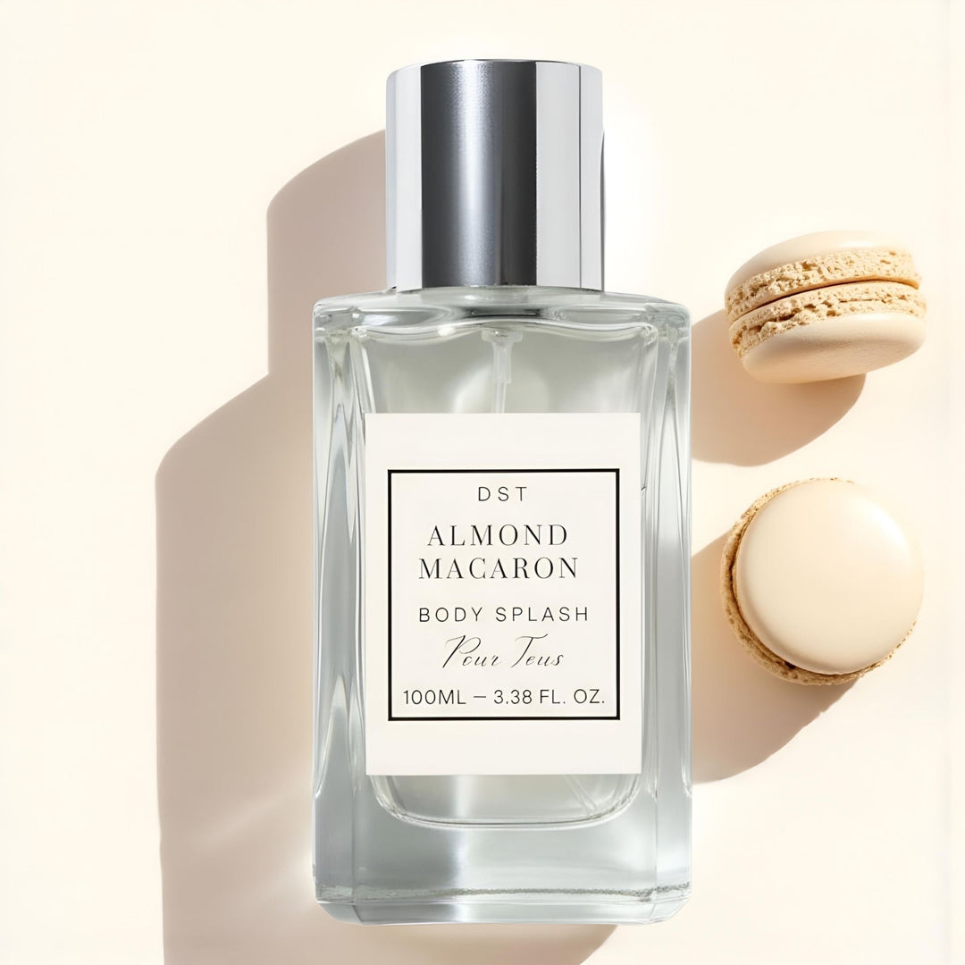 Body splash bottle labeled 'Almond Macaron' with macarons in the background