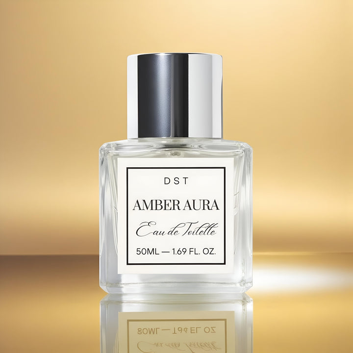 Perfume bottle labeled 'AMBER AURA' with a gold gradient background