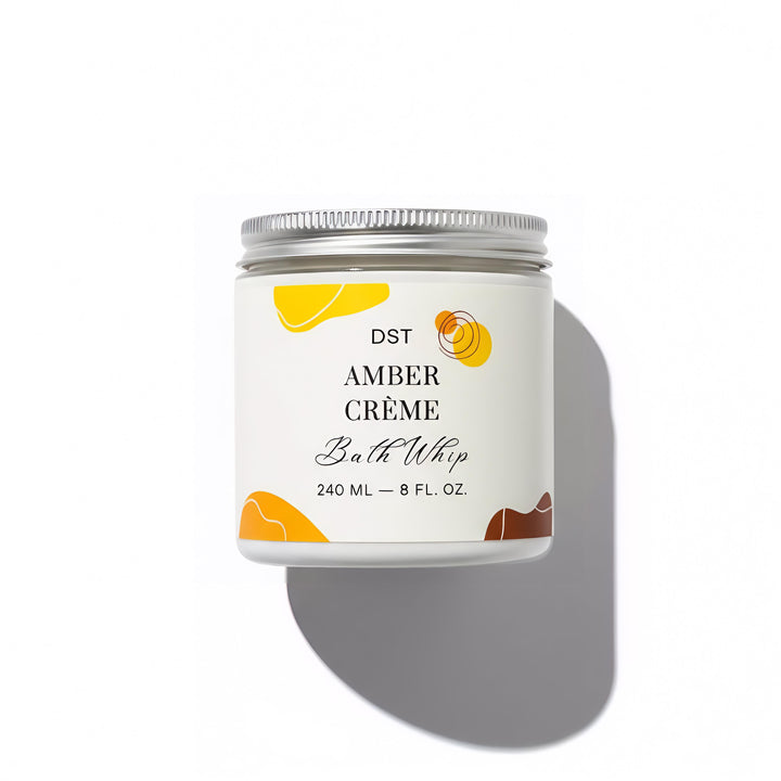 Bath whip container labeled 'DST Amber Cème' with a white background