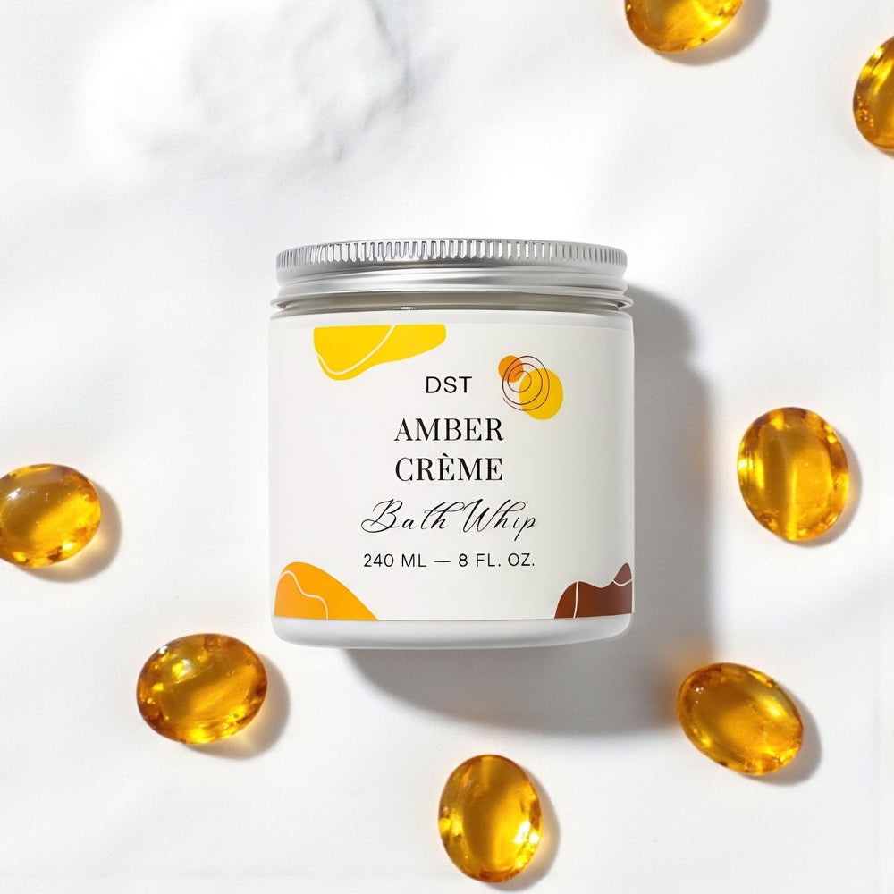 Bath whip container labeled 'DST Amber Cème' with amber color theme on a white background.