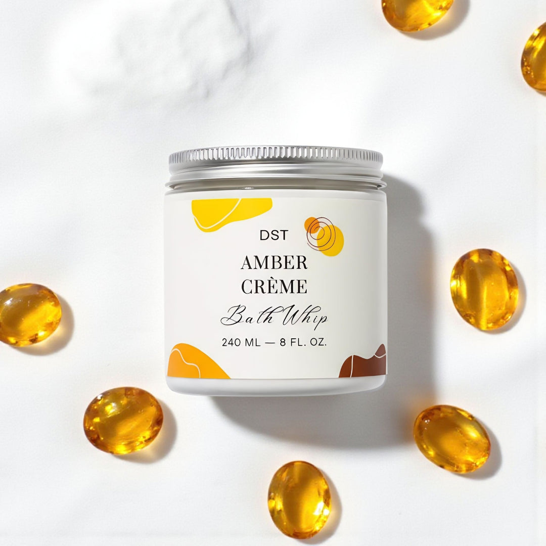 Bath whip container labeled 'DST Amber Cème' with amber color theme on a white background.