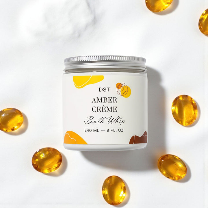 Bath whip container labeled 'DST Amber Cème' with amber color theme on a white background.