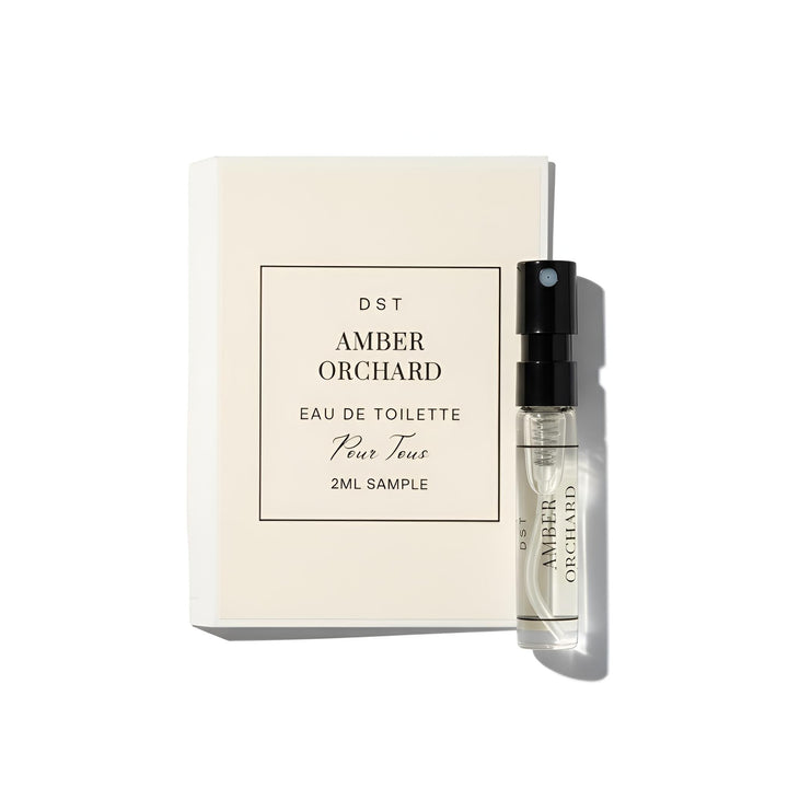 Perfume sample bottle and packaging of 'Amber Orchard' by DST on a white background