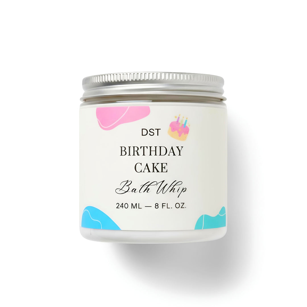 Bath whip container labeled 'DST Birthday Cake' on a white background