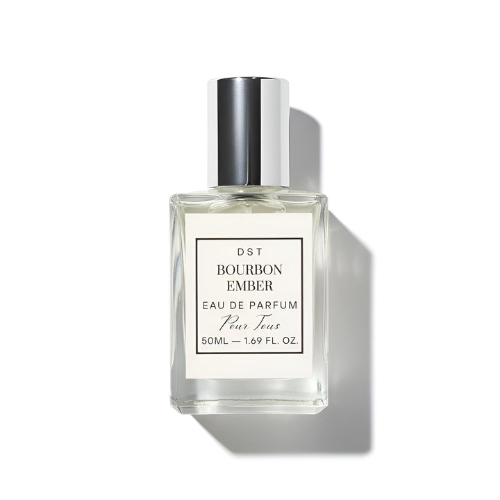 Perfume bottle labeled 'Bourbon Ember' by DST on a white background