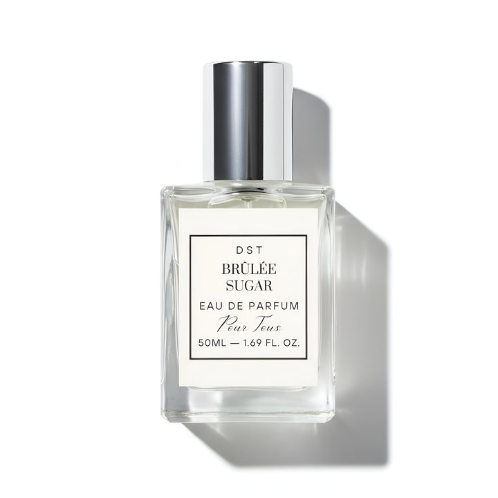 Perfume bottle labeled 'Brèlée Sugar' by DST on a white background