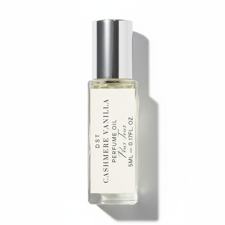 Perfume oil bottle labeled 'Cashmere Vanilla' on a white background