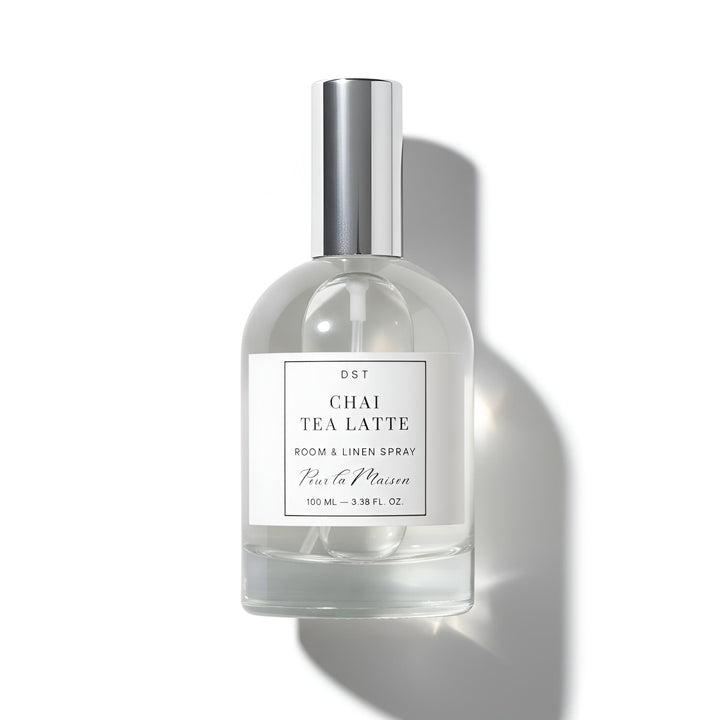Chai Tea Latte room and linen spray bottle with a label on a marble background