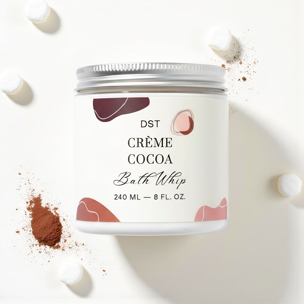 DST Crème Cocoa Bath Whip container with cocoa powder and bath bombs on a white background