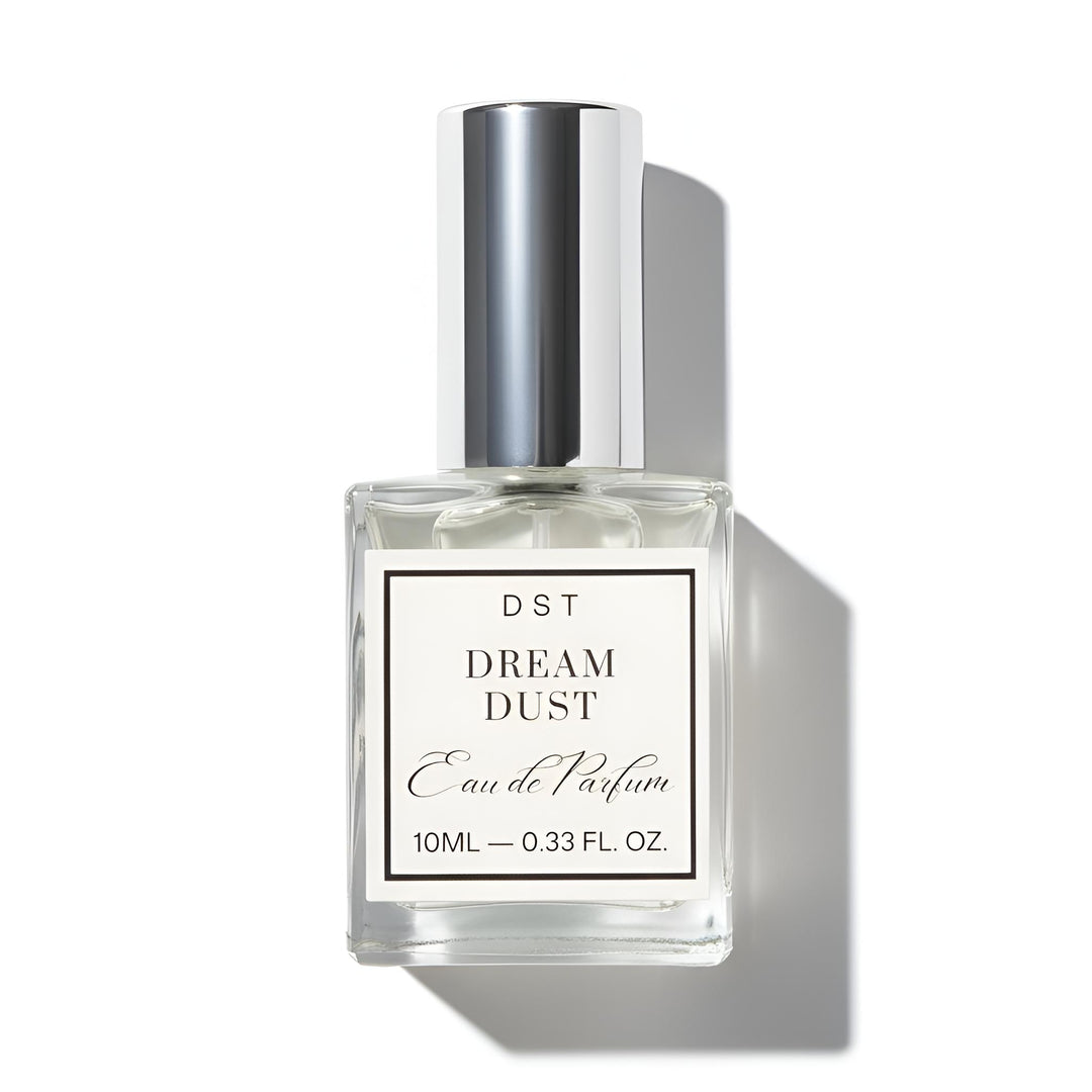 Perfume bottle labeled 'Dream Dust' by DST on a white background