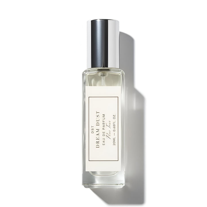 Perfume bottle labeled 'Dream Dust' on a white background