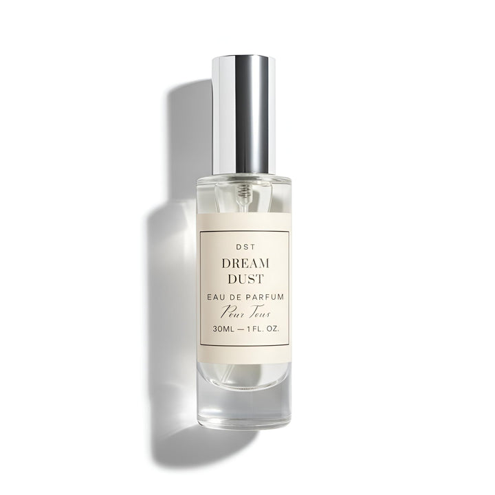 Perfume bottle labeled 'Dream Dust' on a white background
