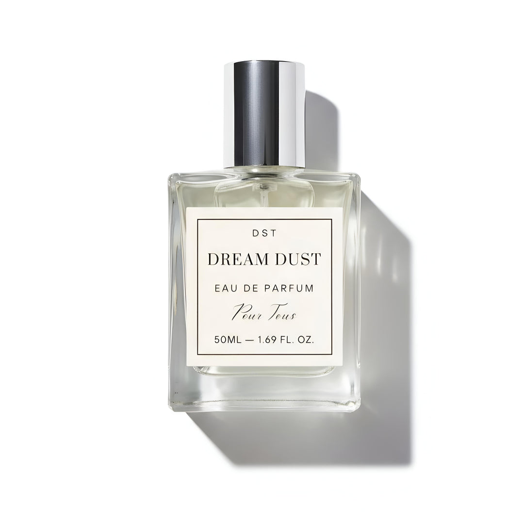 Perfume bottle labeled 'Dream Dust' on a white background