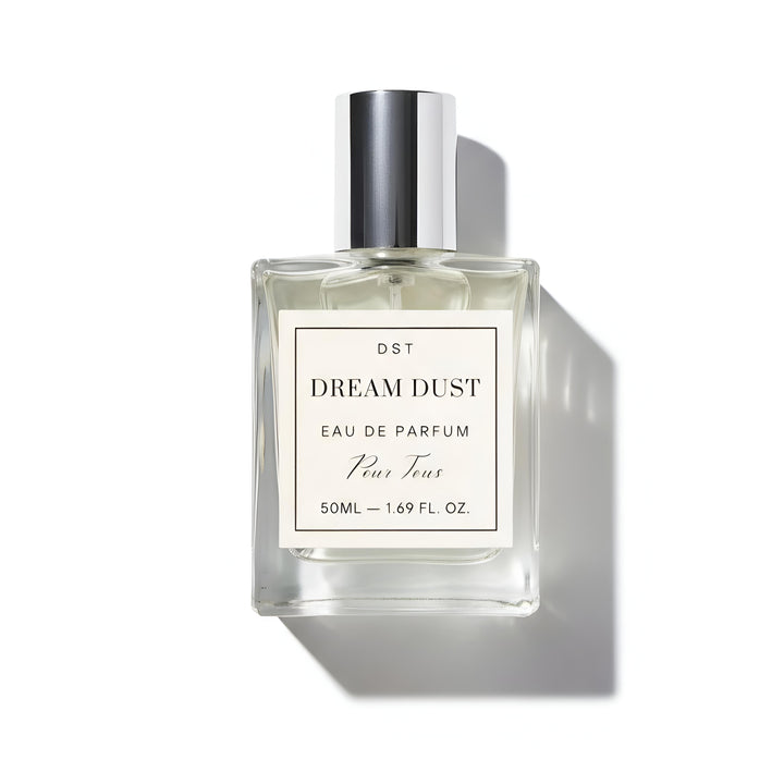 Perfume bottle labeled 'Dream Dust' on a white background