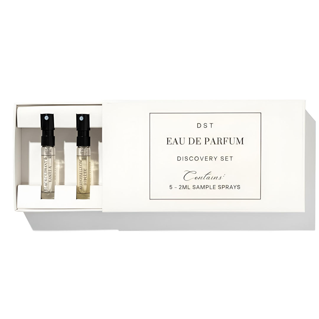DST Fragrances Eau de Parfum discovery set with sample sprays in a beige box on a white background