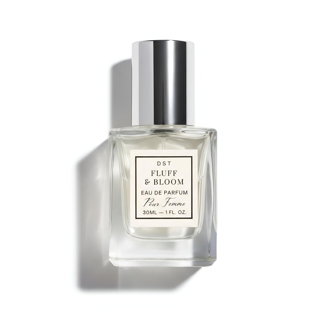 Perfume bottle labeled 'Fluff & Bloom' on a white background