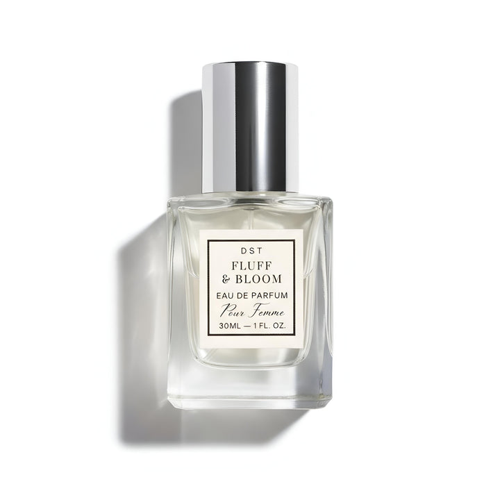 Perfume bottle labeled 'Fluff & Bloom' on a white background