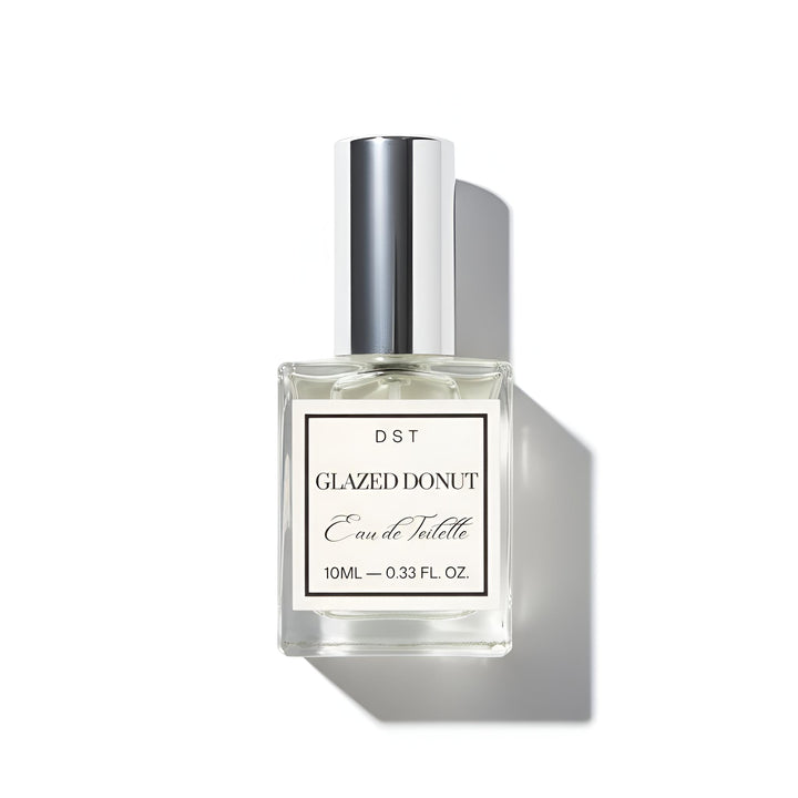 Perfume bottle labeled 'Glazed Donut' by DST on a white background