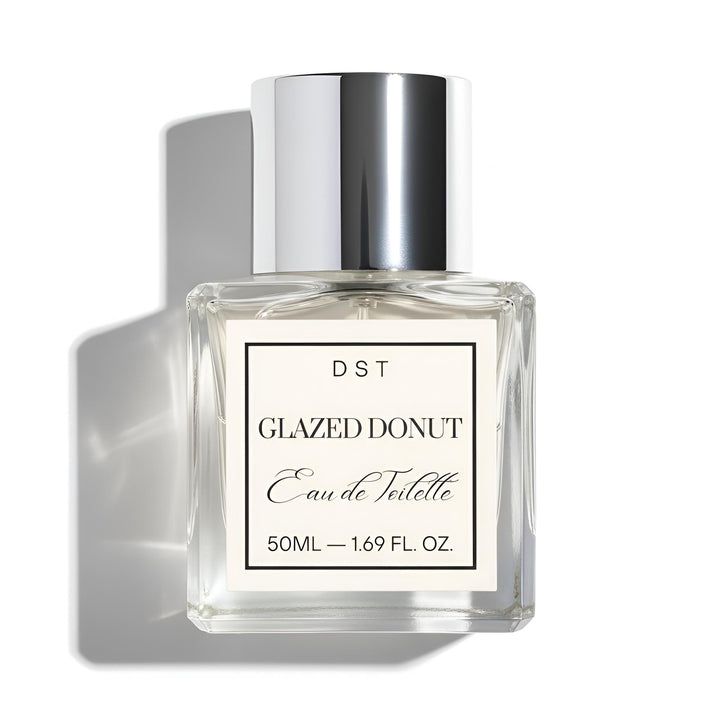 Perfume bottle labeled 'Glazed Donut' by DST on a white background