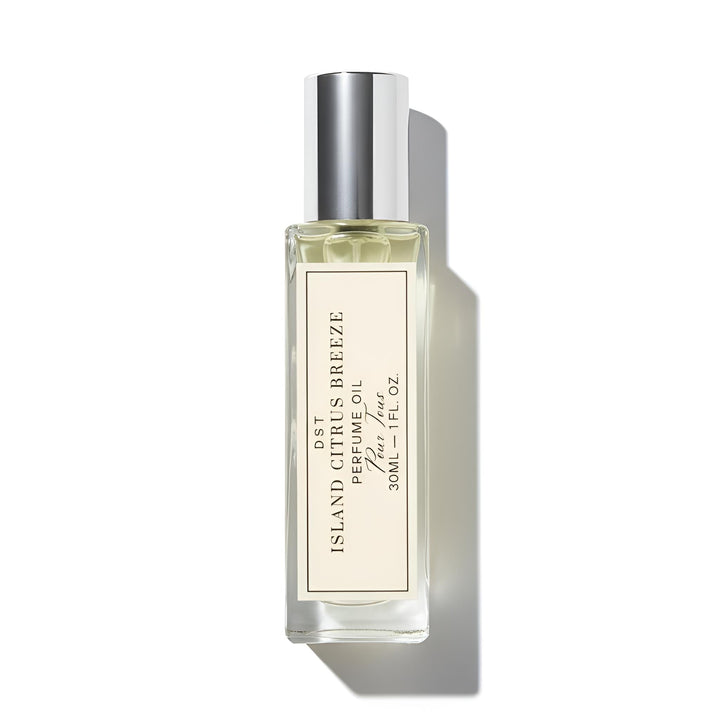 Perfume oil bottle labeled 'Island Citrus Breeze' on a white background