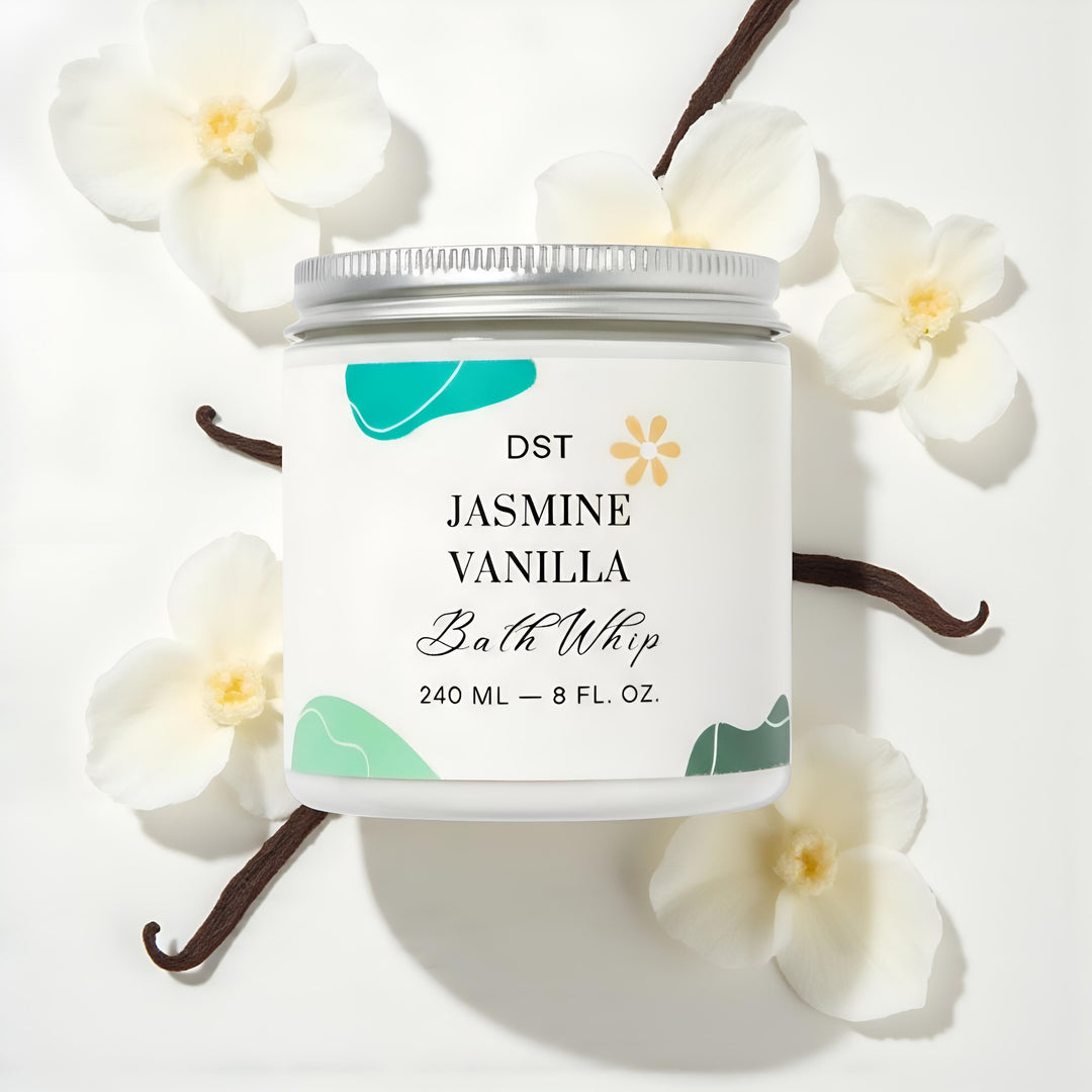 Bath whip container labeled 'DST Jasmine Vanilla' with decorative elements on a light background.