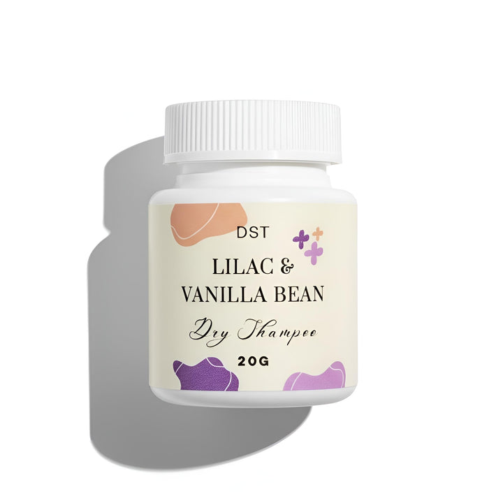 Bottle of DST Lilac & Vanilla Bean Dry Shampoo on a white background