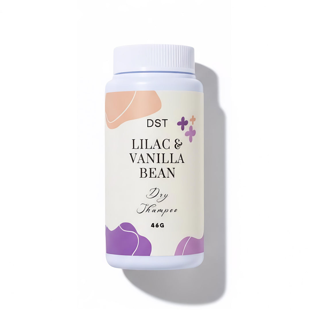 Dry shampoo bottle labeled 'Lilac & Vanilla Bean' by DST on a white background