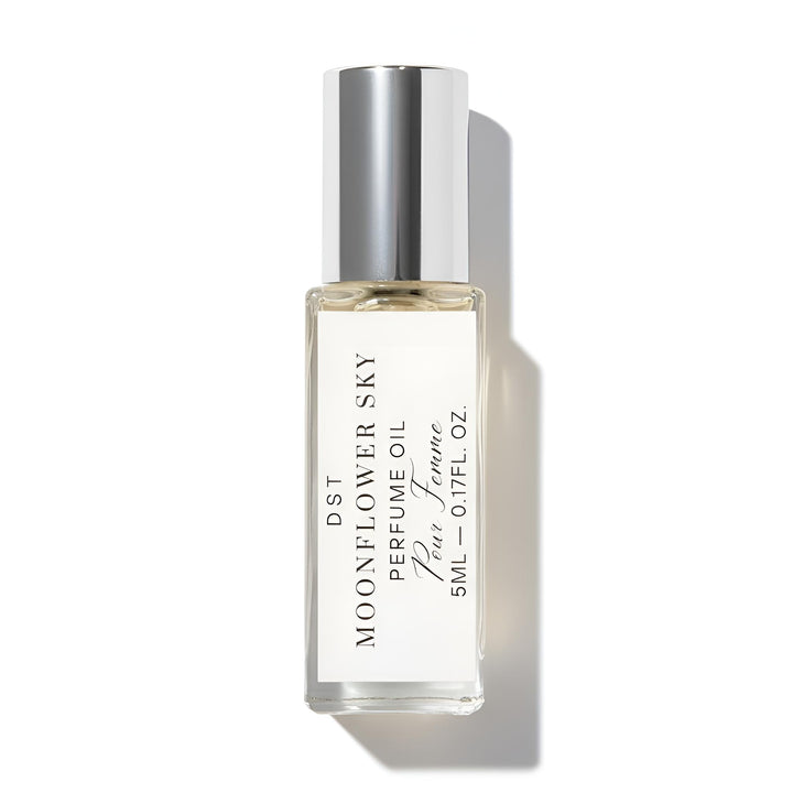 Perfume oil bottle labeled 'Moonflower Sky' on a white background