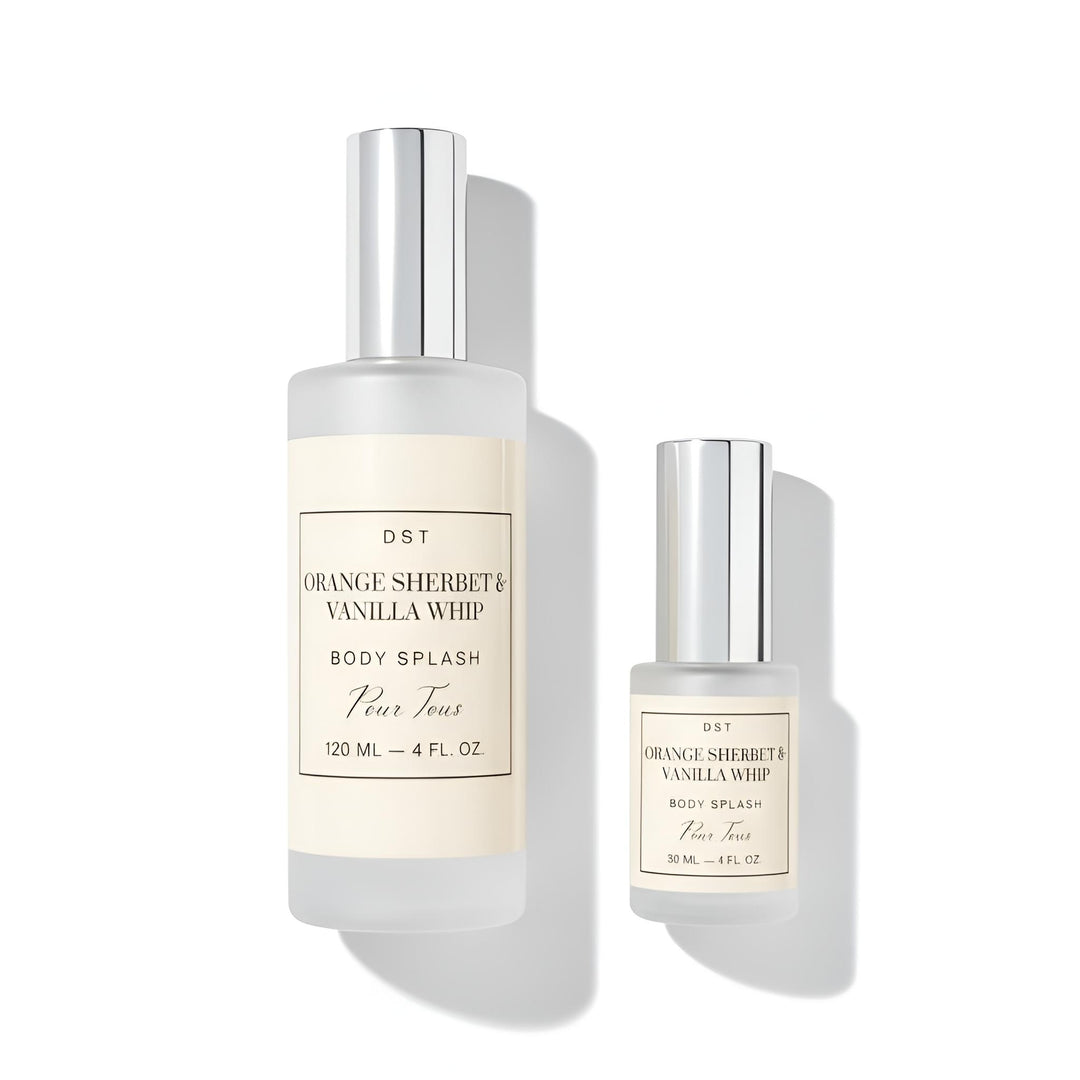 Two body splash bottles labeled 'Orange Sherbet & Vanilla Whip' by DST on a white background.