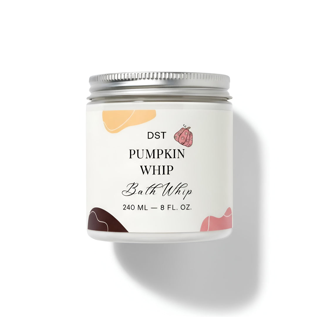 Jar of DST Pumpkin Whip Bath Whip with pumpkins on a white background