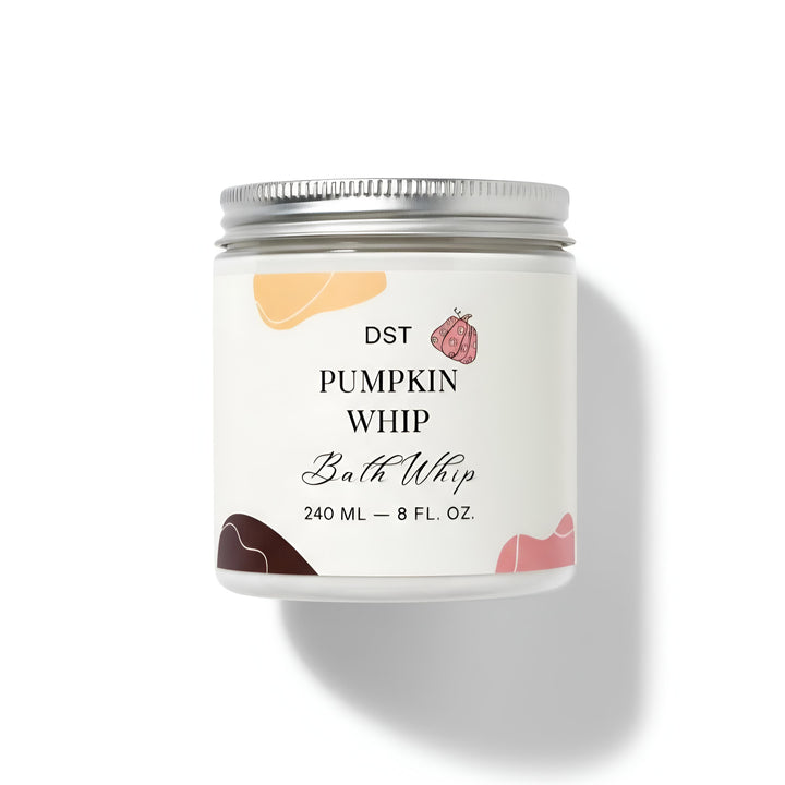 Jar of DST Pumpkin Whip Bath Whip with pumpkins on a white background