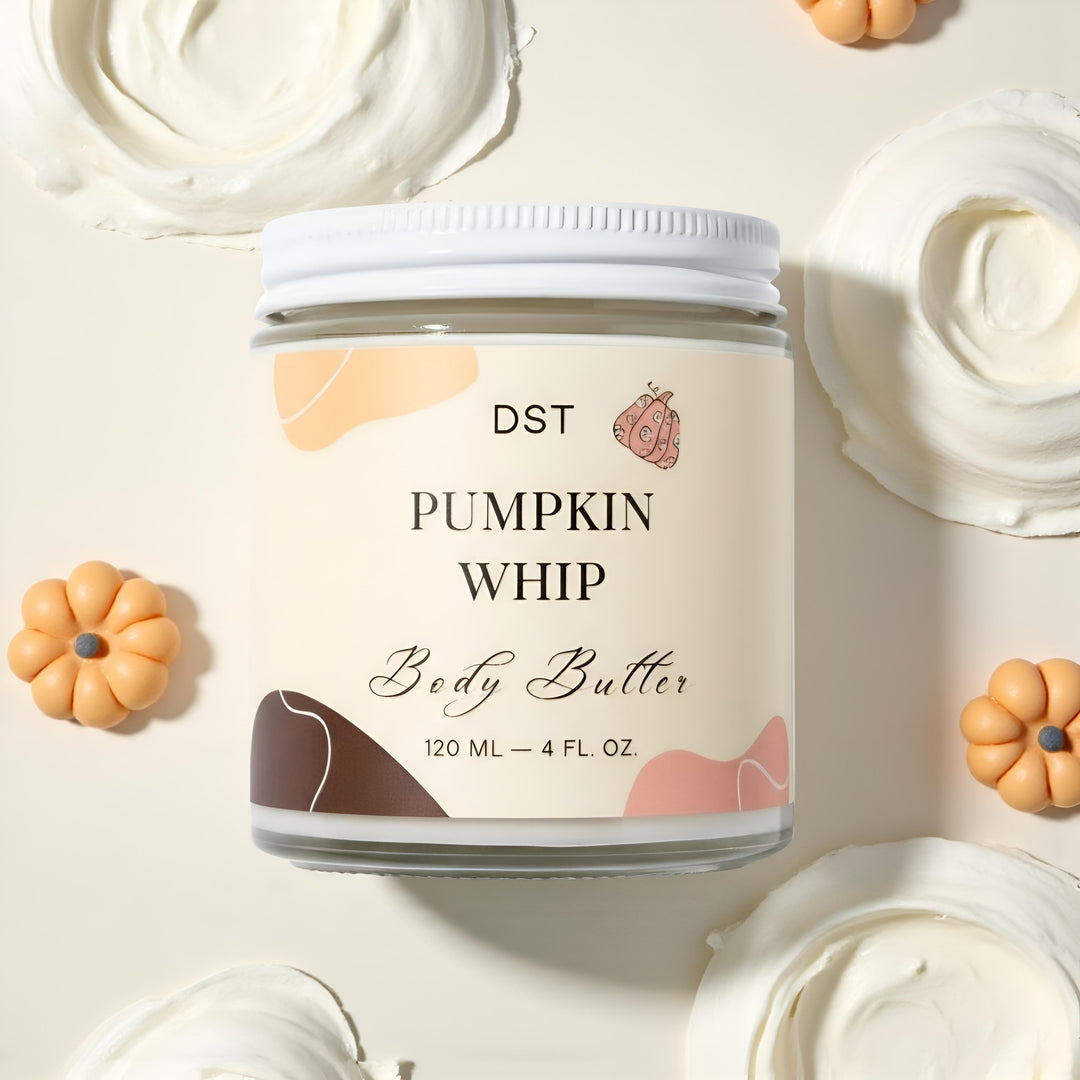 Jar of DST Pumpkin Whip Body Butter with decorative pumpkins on a light background