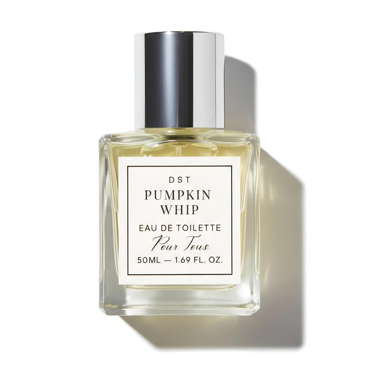 Perfume bottle labeled 'Pumpkin Whip' by DST on a white background