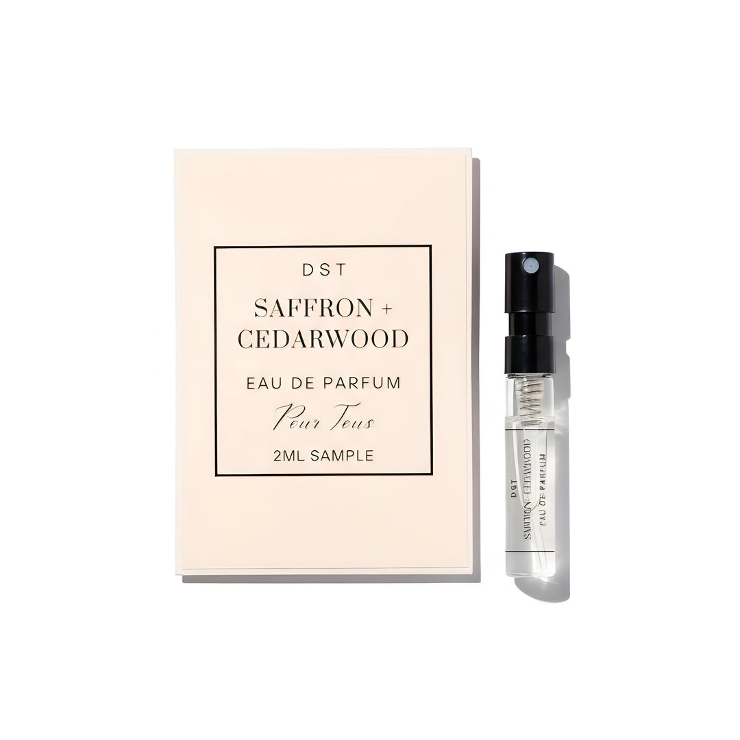 Saffron + Cedarwood Eau de Parfum sample with packaging on a white background