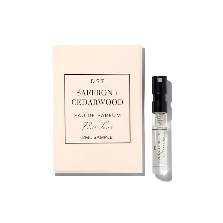 Saffron + Cedarwood Eau de Parfum sample with packaging on a white background
