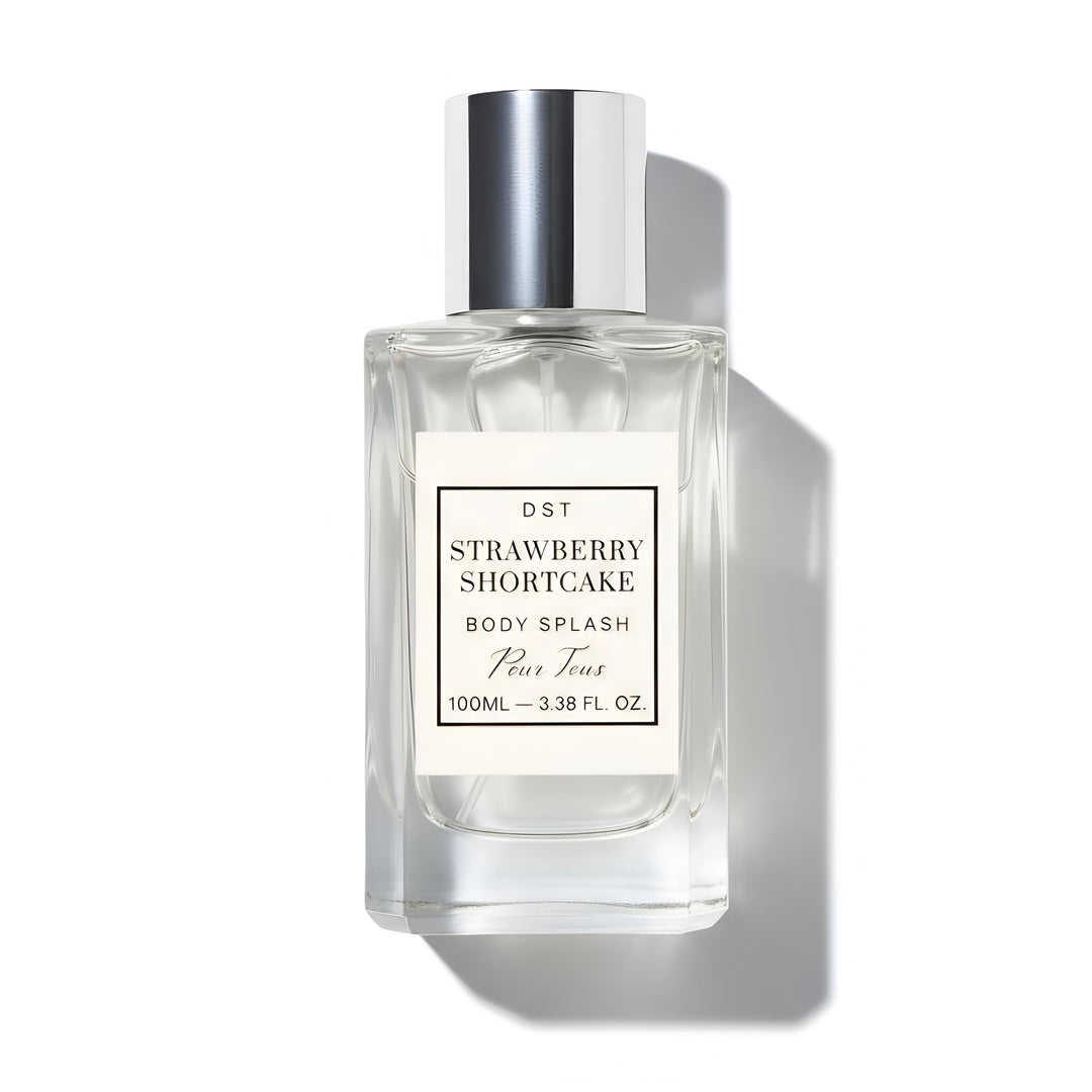 Body splash bottle labeled 'Strawberry Shortcake' by DST on a white background