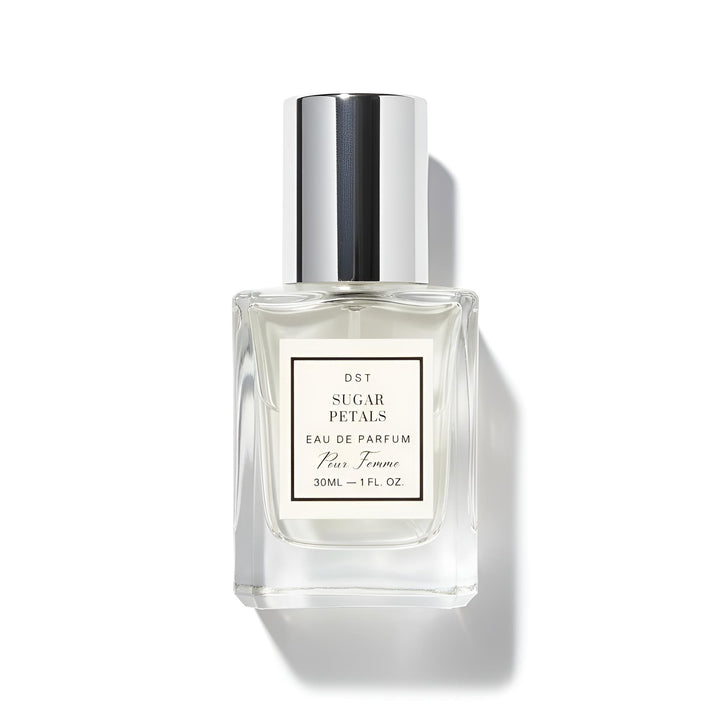 Perfume bottle labeled 'Sugar Petals' by DST on a white background