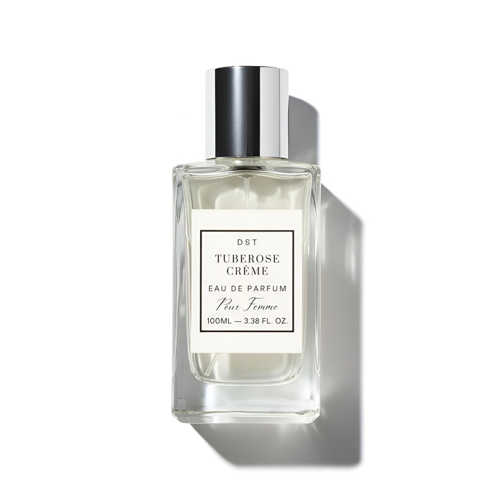 Perfume bottle labeled 'Tuberose Creme' on a white background