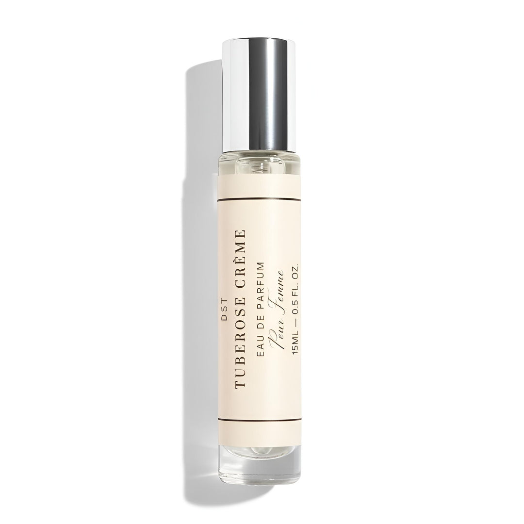 Perfume bottle labeled 'Tuberose Creme' on a white background