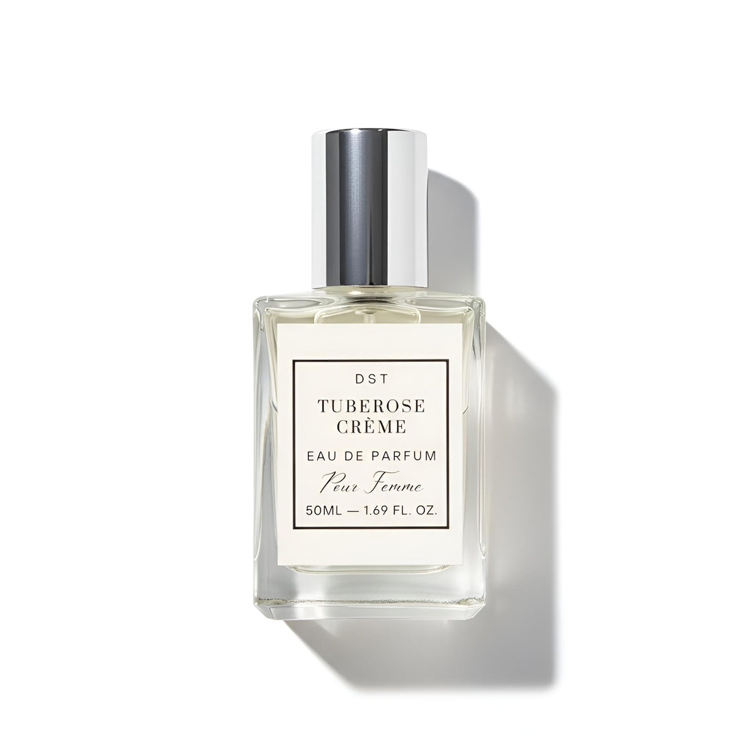 Perfume bottle labeled 'Tuberose Creme' on a white background