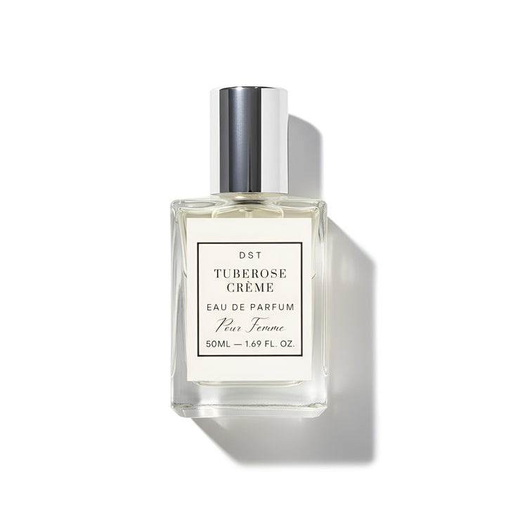 Perfume bottle labeled 'Tuberose Creme' on a white background