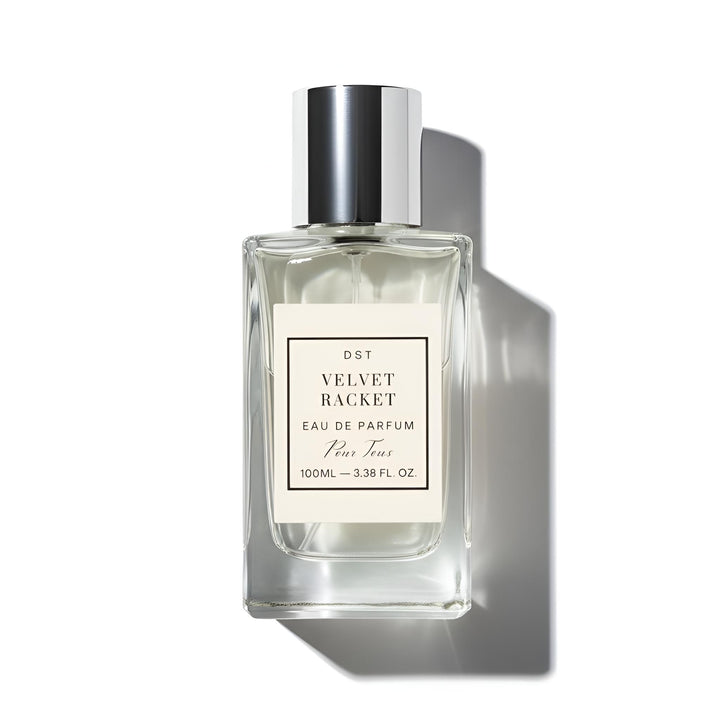 Perfume bottle labeled 'Velvet Racket' on a white background