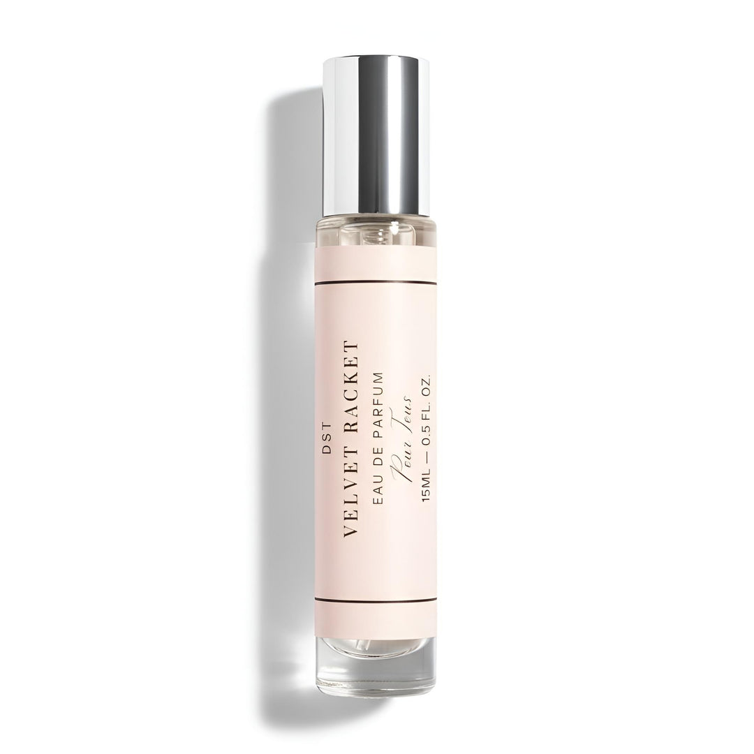 Perfume bottle labeled 'Velvet Racket' on a white background