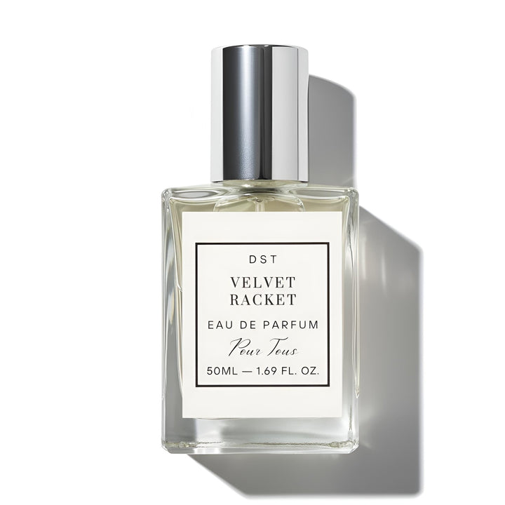 Perfume bottle labeled 'Velvet Racket' on a white background