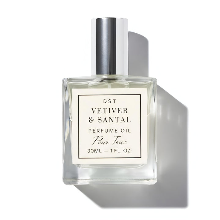 Perfume oil bottle labeled 'Vetiver & Santal' on a white background