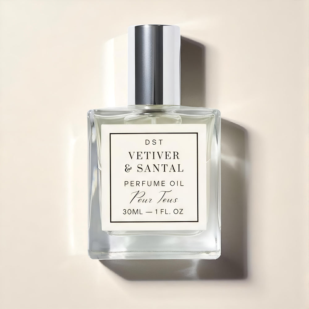 Perfume oil bottle labeled 'Vetiver & Santal' on a beige background