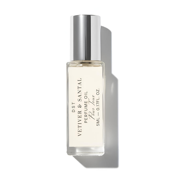 vetiver Santal Perfume oil bottle with silver cap on a white background