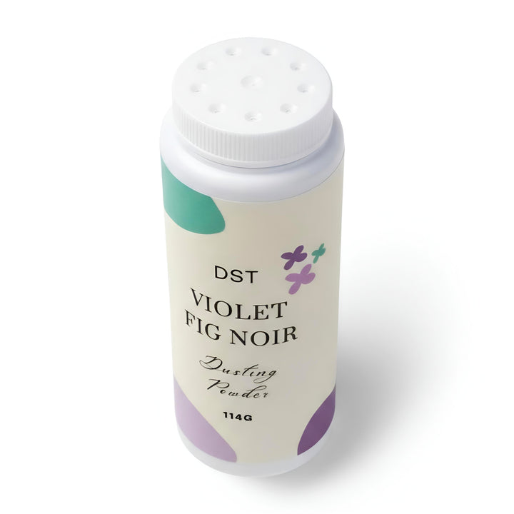 DST Fragrances 'Violet Fig Noir' with floral designs on a white background