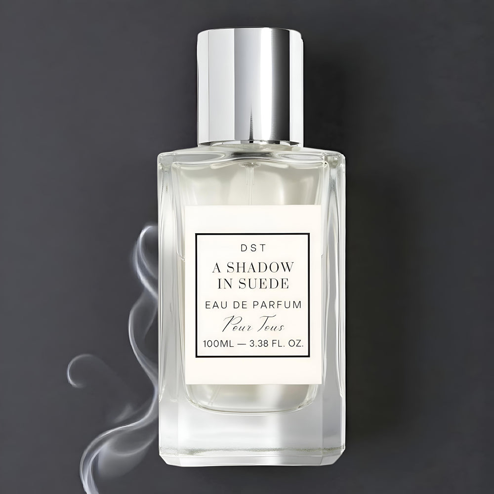 A Shadow in Suede Eau de Parfum against a smokey grey background.