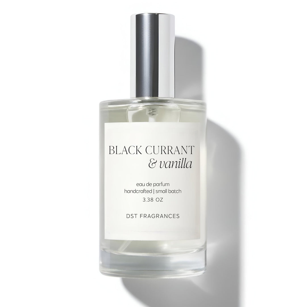 100ml bottle of Black Currant Vanilla Eau de Parfum by DST Fragrances against a white background.